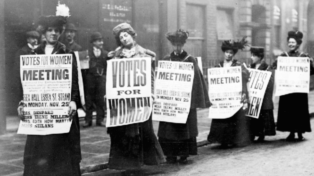Vintage black and white image of women protesting in support of Votes for Women
